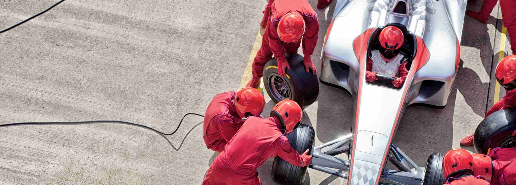 Image showing a racing team working on a pit stop