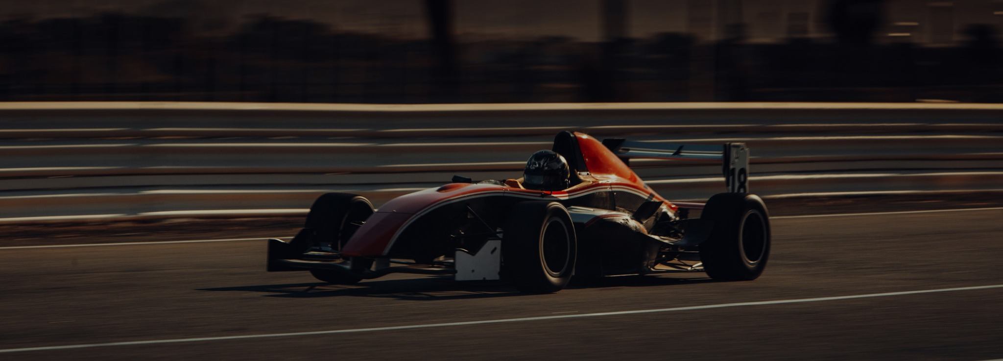 Image showing a formula one race car competing on motorsport track